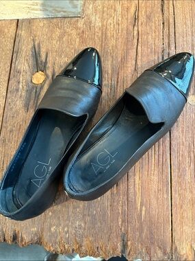 AGL Black Leather Slip-On Loafers with Patent Cap Toe